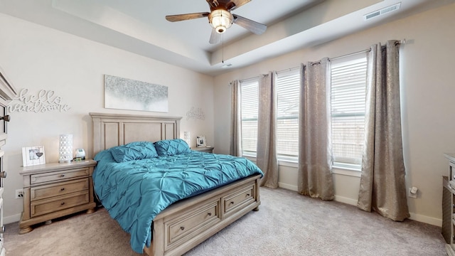 308 Whisper Wood Way, Lebanon, TN 37087 - bedroom featuring light colored carpet, multiple windows, a tray ceiling, and ceiling fan
