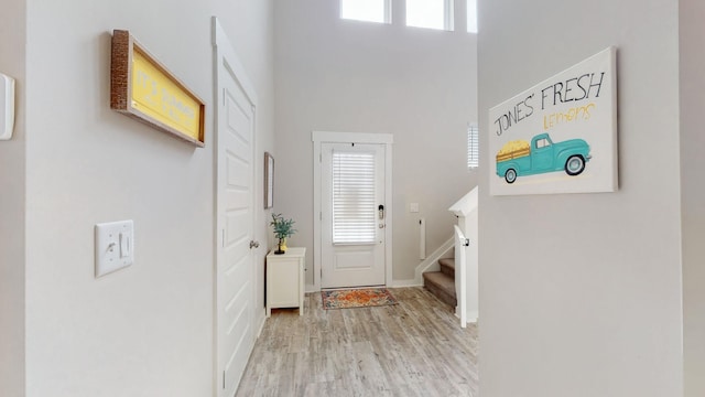 308 Whisper Wood Way, Lebanon, TN 37087 - foyer entrance featuring a high ceiling, light wood finished floors, and stairway
