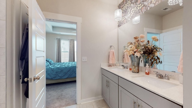 308 Whisper Wood Way, Lebanon, TN 37087 - ensuite bathroom featuring double vanity, tile patterned floors, and a chandelier