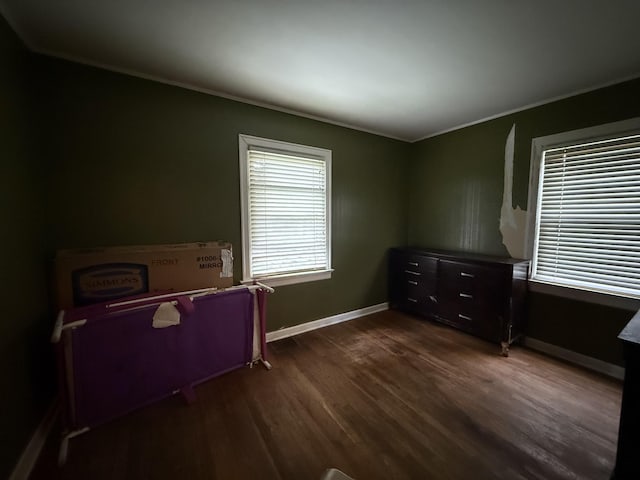 234 Ridgewood Ave, Paducah, KY 42001 - bedroom featuring dark wood-type flooring and crown molding