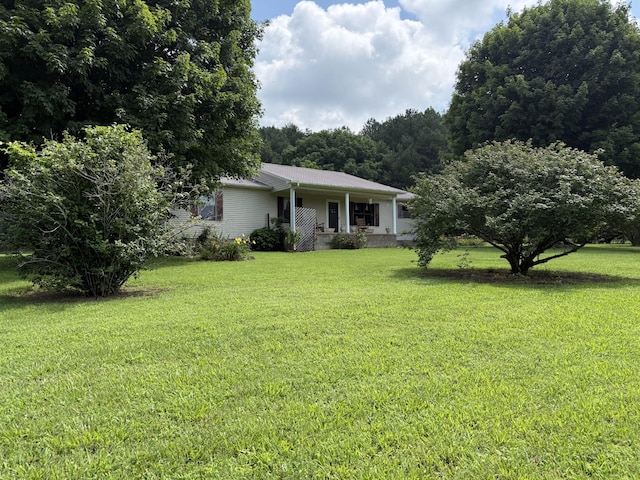 46 Brier Hill Rd, Ethridge, TN 38456 - view of front facade with a front yard and a porch
