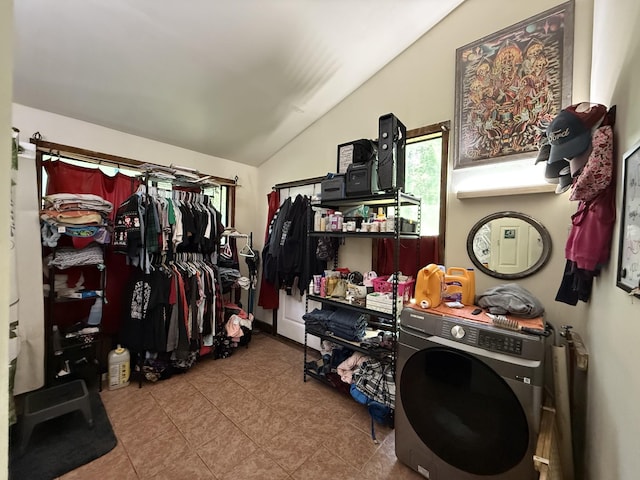180 Webb Rd, Summertown, TN 38483 - spacious closet with lofted ceiling, tile patterned floors, and washer / dryer