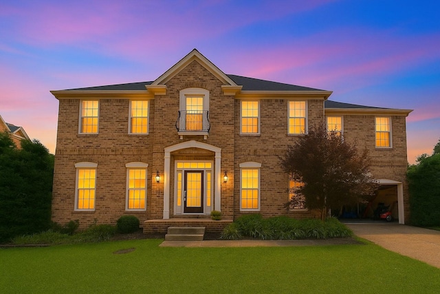 912 Falling Water Ct, Nashville, TN 37221 - colonial-style house featuring a yard, brick siding, and driveway