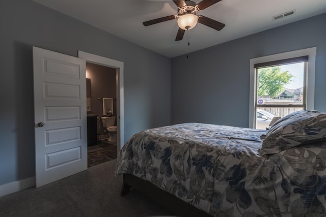 1652 Lantana Dr, Thompsons Station, TN 37179 - bedroom with dark colored carpet, ensuite bathroom, and ceiling fan