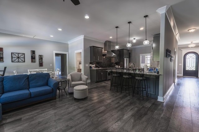 1652 Lantana Dr, Thompsons Station, TN 37179 - living area featuring ornamental molding, dark wood finished floors, and recessed lighting