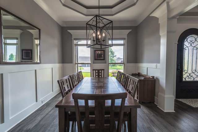 1652 Lantana Dr, Thompsons Station, TN 37179 - dining room featuring a chandelier, a decorative wall, ornamental molding, a wainscoted wall, and dark wood-type flooring