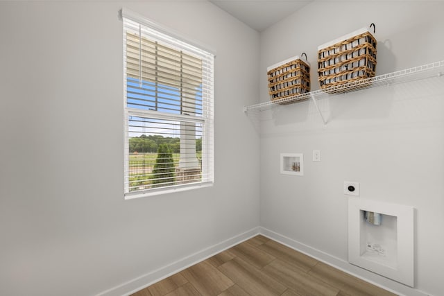 7214 Hanworth St, Fairview, TN 37062 - washroom with hookup for an electric dryer, washer hookup, and wood finished floors
