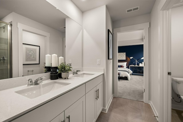 7212 Hanworth St, Fairview, TN 37062 - bathroom with double vanity, connected bathroom, and tiled shower