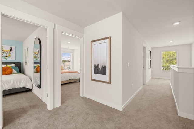 7212 Hanworth St, Fairview, TN 37062 - hallway with light colored carpet, healthy amount of natural light, and recessed lighting