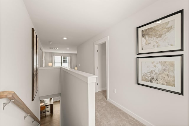 7212 Hanworth St, Fairview, TN 37062 - hallway with an upstairs landing, recessed lighting, and carpet flooring