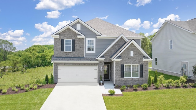 7212 Hanworth St, Fairview, TN 37062 - craftsman-style house with concrete driveway, brick siding, a garage, a front lawn, and roof with shingles
