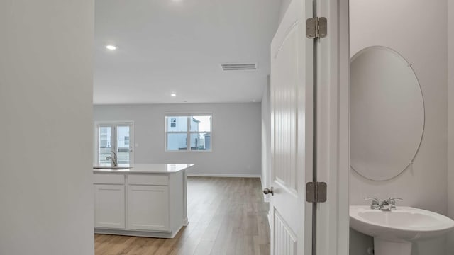 88 Hartmann Crossing Dr, Lebanon, TN 37087 - hallway featuring light wood finished floors and recessed lighting