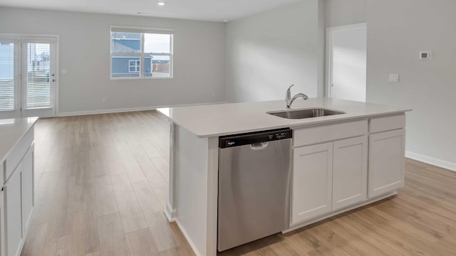 88 Hartmann Crossing Dr, Lebanon, TN 37087 - kitchen with stainless steel dishwasher, light wood finished floors, white cabinetry, plenty of natural light, and recessed lighting