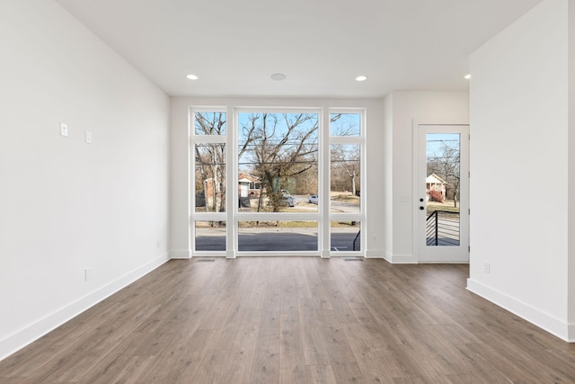 910 Youngs Ln Unit 4, Nashville, TN 37207 - empty room with wood finished floors and recessed lighting