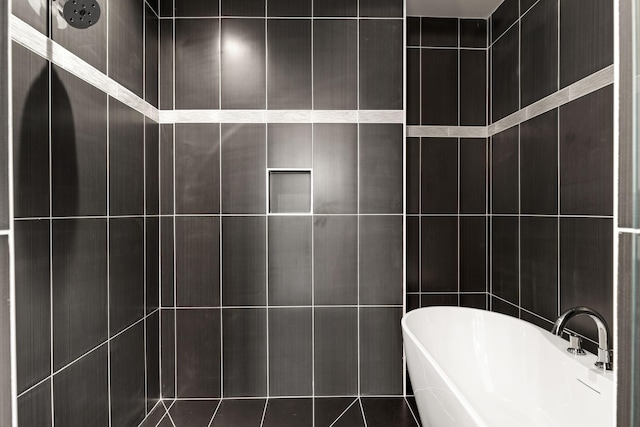 910 Youngs Ln Unit 4, Nashville, TN 37207 - full bath with a freestanding tub, tile walls, and tiled shower
