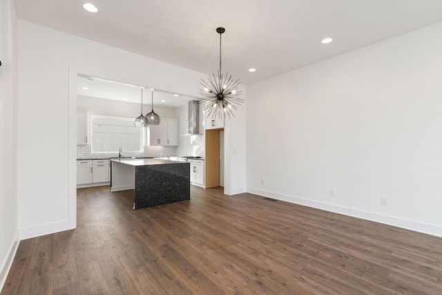 910 Youngs Ln Unit 4, Nashville, TN 37207 - kitchen featuring a center island, white cabinetry, tasteful backsplash, a chandelier, and recessed lighting