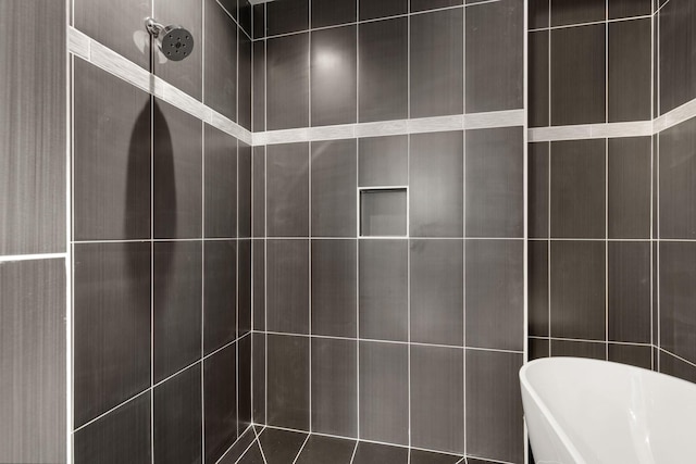 910 Youngs Ln Unit 4, Nashville, TN 37207 - bathroom with a freestanding bath, a tile shower, and tile walls