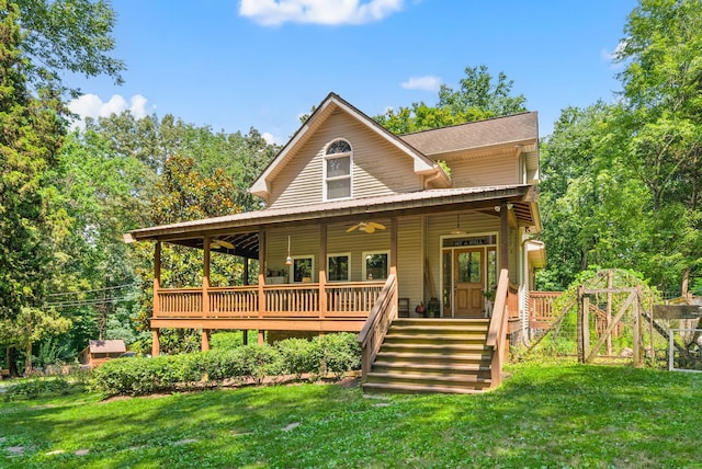 825 Durham Rd, Adams, TN 37010 - back of property featuring ceiling fan, a yard, stairway, and a wooden deck
