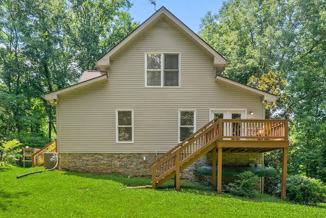 825 Durham Rd, Adams, TN 37010 - rear view of property with stairway, a wooden deck, a yard, and stone siding