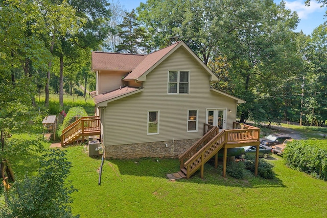 825 Durham Rd, Adams, TN 37010 - rear view of property with stairs, a wooden deck, and a lawn