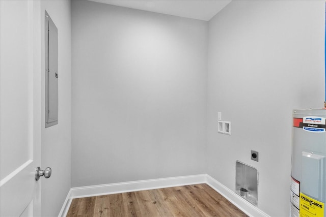 763 Potter Rd, Dickson, TN 37055 - washroom with water heater, electric dryer hookup, washer hookup, and wood finished floors
