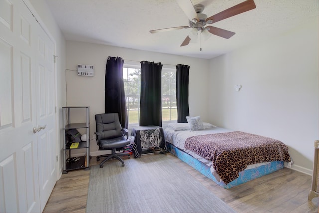 6117 Aedc Rd, Winchester, TN 37398 - bedroom with light wood-style floors and a ceiling fan