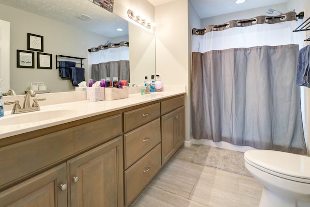 6117 Aedc Rd, Winchester, TN 37398 - full bathroom featuring double vanity, tile patterned floors, and recessed lighting