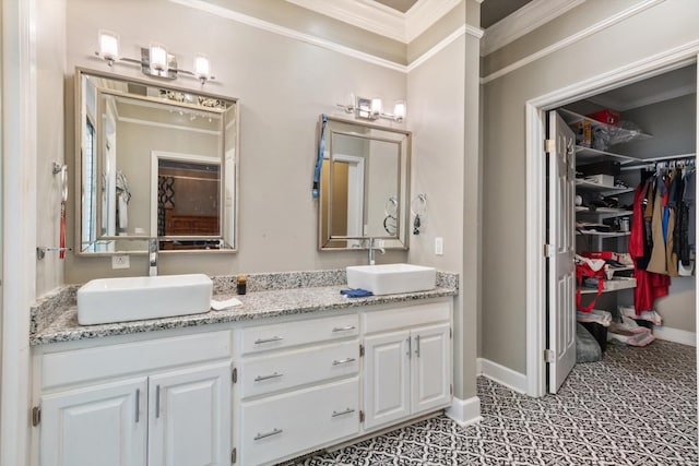 1104 Golf Course Ln, Ashland City, TN 37015 - bathroom with crown molding, double vanity, and a walk in closet