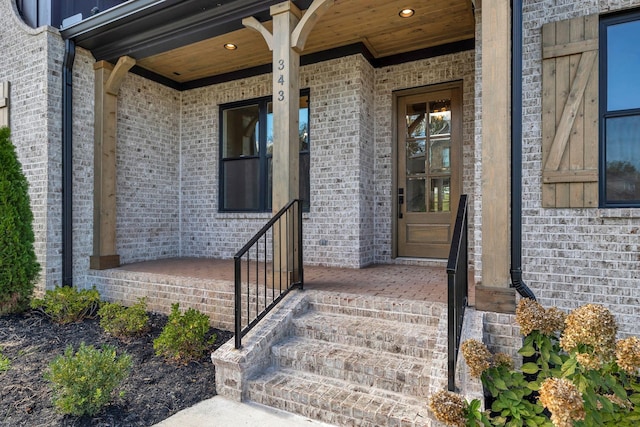 343 Circuit Rd, Franklin, TN 37064 - view of exterior entry with a porch and brick siding