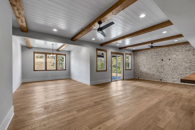 343 Circuit Rd, Franklin, TN 37064 - unfurnished living room featuring brick wall, a ceiling fan, light wood finished floors, healthy amount of natural light, and beam ceiling