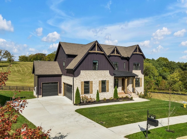 343 Circuit Rd, Franklin, TN 37064 - view of front facade with an attached garage, concrete driveway, a shingled roof, board and batten siding, and a standing seam roof
