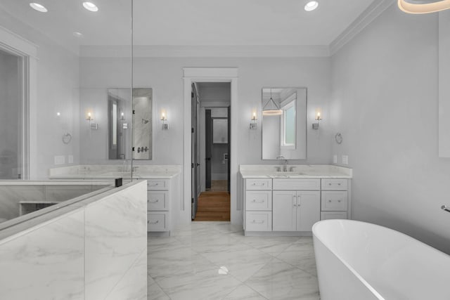 343 Circuit Rd, Franklin, TN 37064 - full bath with a soaking tub, vanity, marble finish floors, ornamental molding, and recessed lighting