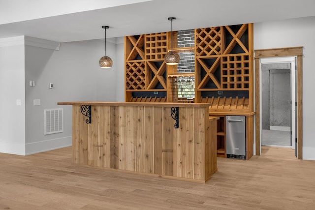 343 Circuit Rd, Franklin, TN 37064 - wine area with a bar and light wood-type flooring