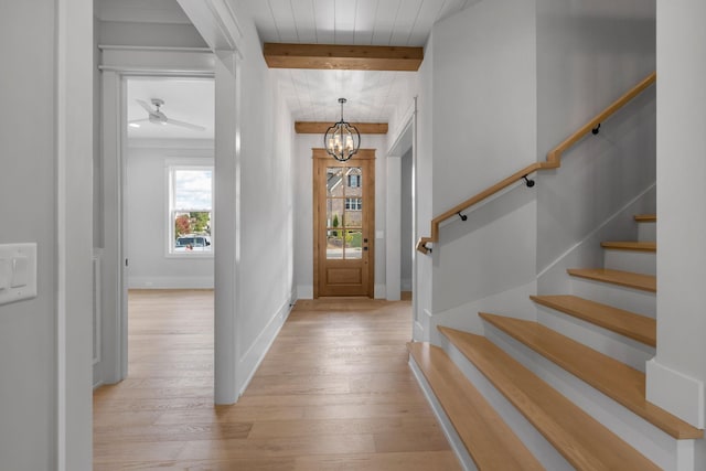 343 Circuit Rd, Franklin, TN 37064 - foyer entrance with light wood finished floors, beam ceiling, a chandelier, stairway, and a ceiling fan