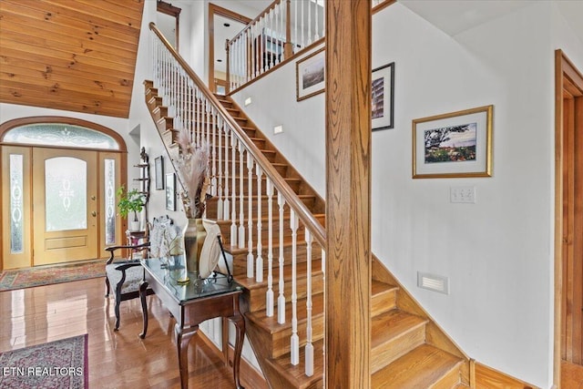 802 Stonegate Way, Townsend, TN 37882 - entrance foyer featuring stairway, high vaulted ceiling, and wood finished floors