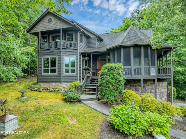 802 Stonegate Way, Townsend, TN 37882 - view of front of home with a balcony, a front lawn, a sunroom, stairs, and a shingled roof