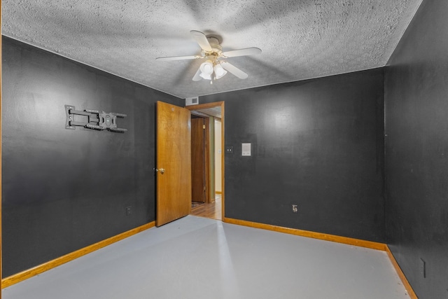 183 Jerry Smith Rd, Indian Mound, TN 37079 - empty room featuring ceiling fan and a textured ceiling