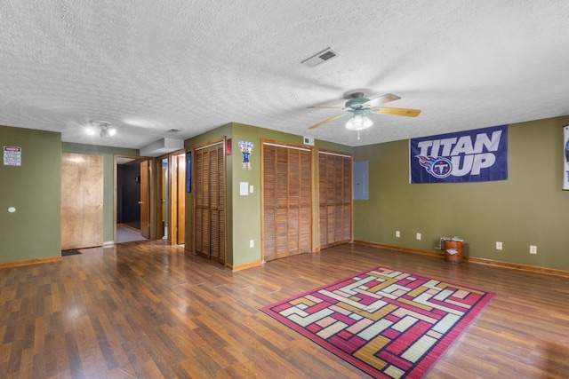 183 Jerry Smith Rd, Indian Mound, TN 37079 - empty room with a ceiling fan, wood finished floors, a textured ceiling, and electric panel