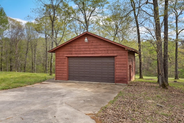 183 Jerry Smith Rd, Indian Mound, TN 37079 - detached garage featuring a view of trees