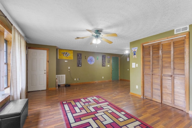 183 Jerry Smith Rd, Indian Mound, TN 37079 - rec room featuring ceiling fan, wood finished floors, and a textured ceiling