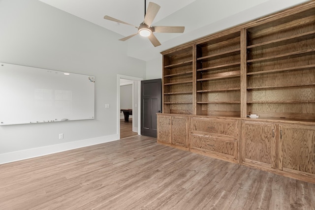 3945 Hartsville Rd, Lafayette, TN 37083 - unfurnished living room featuring light wood-style floors, high vaulted ceiling, and ceiling fan