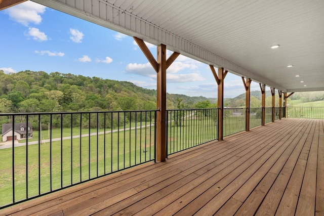 3945 Hartsville Rd, Lafayette, TN 37083 - deck with a lawn and a view of trees