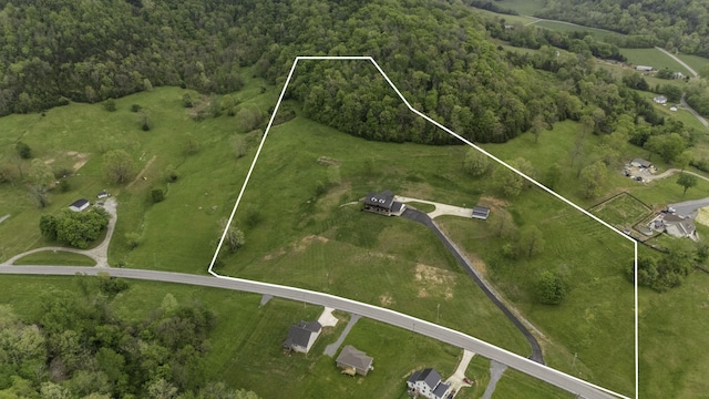3945 Hartsville Rd, Lafayette, TN 37083 - aerial overview of property's location featuring property parcel outlined and a heavily wooded area