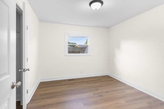 222 Jackson St, Lawrenceburg, TN 38464 - unfurnished room with wood finished floors and baseboards