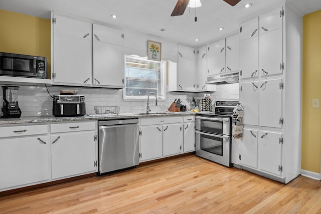 314 W 2nd St, Jasper, TN 37347 - kitchen with stainless steel appliances, under cabinet range hood, ceiling fan, white cabinetry, and recessed lighting