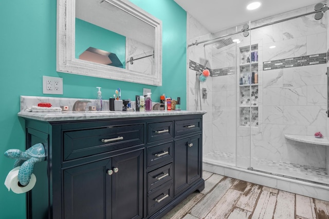 314 W 2nd St, Jasper, TN 37347 - full bathroom featuring vanity, a marble finish shower, wood finished floors, and recessed lighting