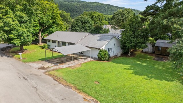 314 W 2nd St, Jasper, TN 37347 - aerial view of property and surrounding area with a forest