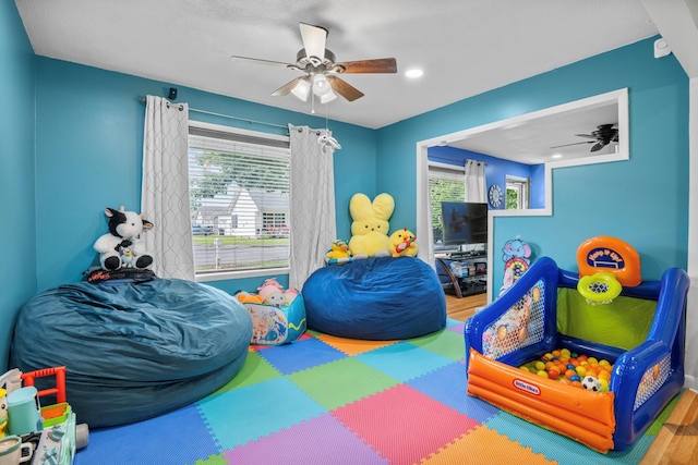 314 W 2nd St, Jasper, TN 37347 - game room featuring a ceiling fan, plenty of natural light, and wood finished floors