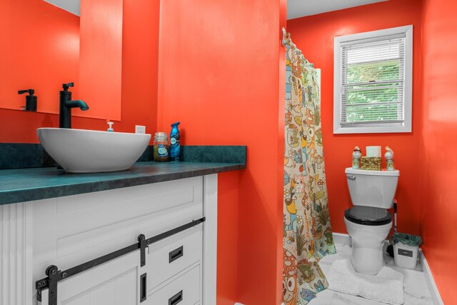 314 W 2nd St, Jasper, TN 37347 - full bath featuring vanity, marble look tile flooring, and curtained shower