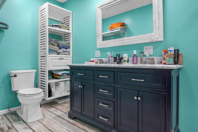314 W 2nd St, Jasper, TN 37347 - bathroom with vanity and wood finished floors
